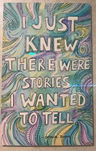 A watercolor in blues and purples with the quotation "I just knew there were stories I wanted to tell." Octavia Butler