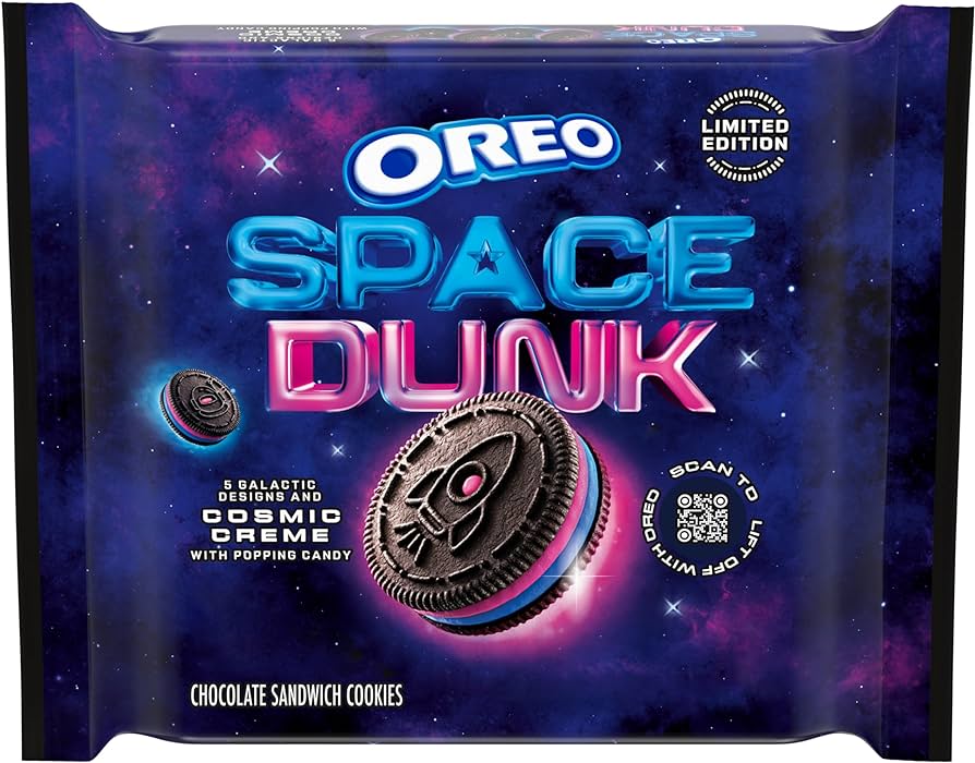 A picture of a package of Space Dunk Oreos. The packaging is dark blue/purple, the word Space is blue and the word Dunk is Pink. The filling of the cookie matches the color of the text.